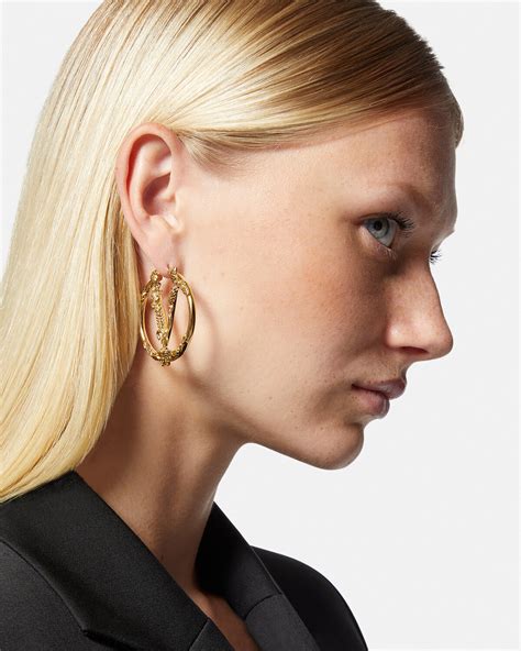 versace gold hoop earrings.